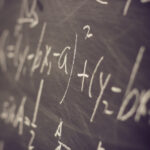 math equations on a chalkboard