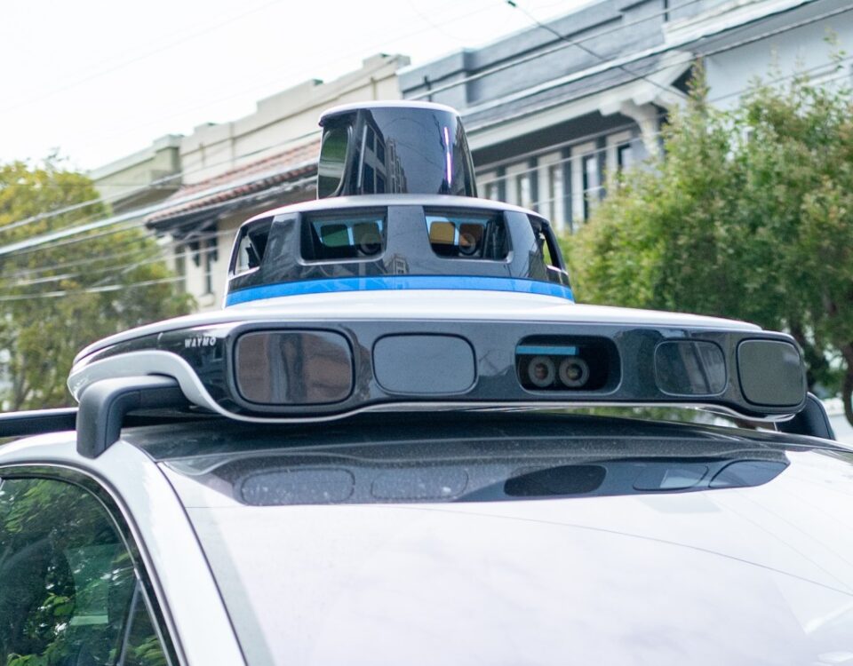 A Waymo self-driving car is seen in the Inner Richmond neighborhood of San Francisco, California, with the Lidar unit on the vehicle visible, November 17, 2024.