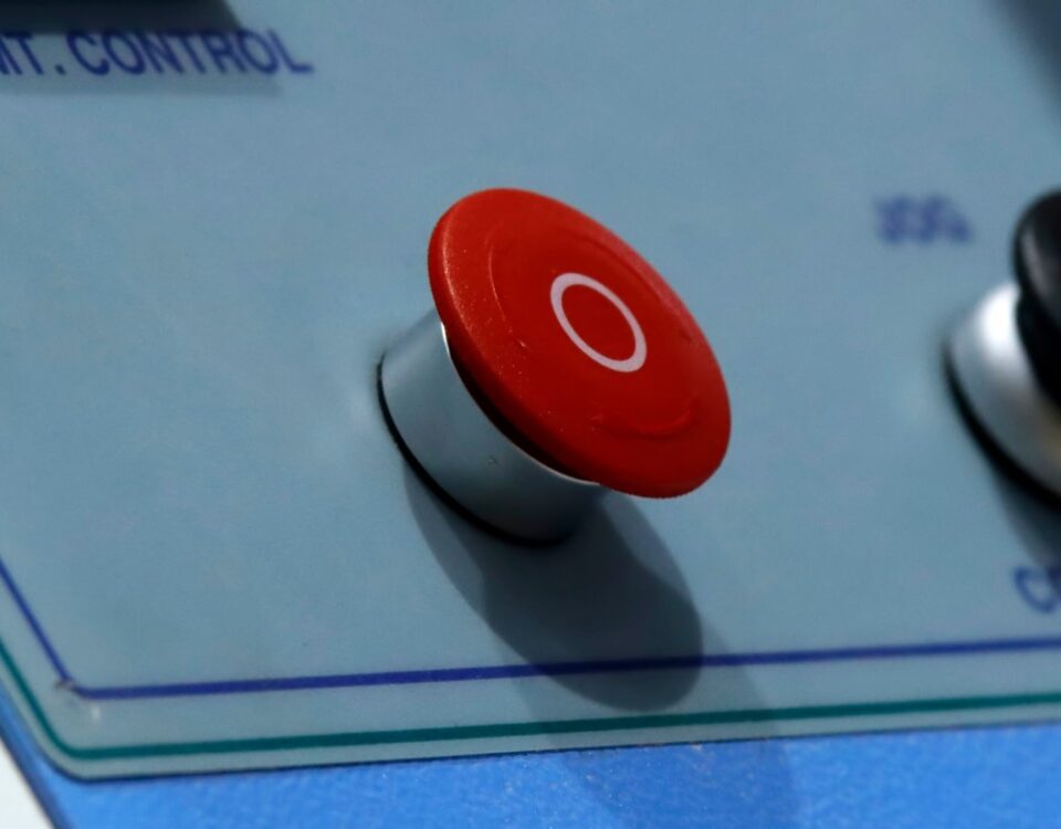 a photo of a red emergency stop button