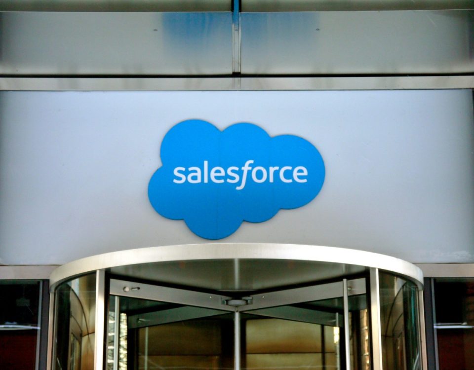 Close-up view of the logo at the entrance to the Salesforce office located at 111 West Illinois Street in Chicago, Illinois, January 2019.
