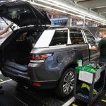 a photo of the Jaguar Land Rover vehicle production line at a factory in the U.K.