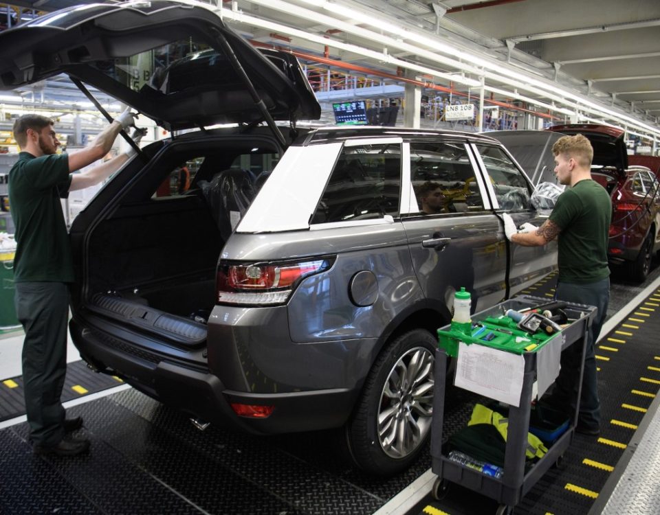 a photo of the Jaguar Land Rover vehicle production line at a factory in the U.K.