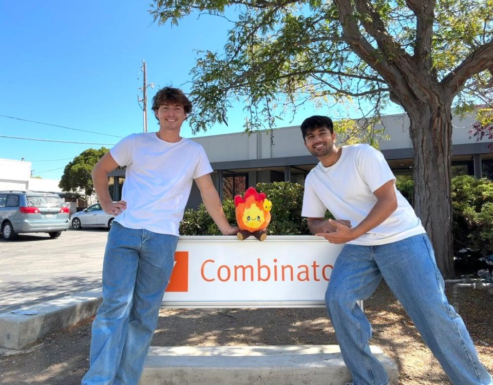 Candle founders at the Y Combinator sign