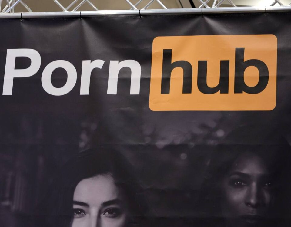 A sign hangs at the Pornhub booth at the 2023 AVN Adult Entertainment Expo at Resorts World Las Vegas on January 06, 2023 in Las Vegas, Nevada.