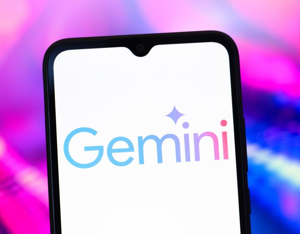 The Google Gemini AI logo is seen displayed on a smartphone screen.