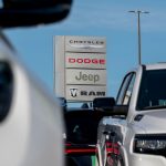 Chrysler, Dodge, Jeep, and Ram signage at a dealership in Richmond, California, US, on Monday, March 3, 2025.