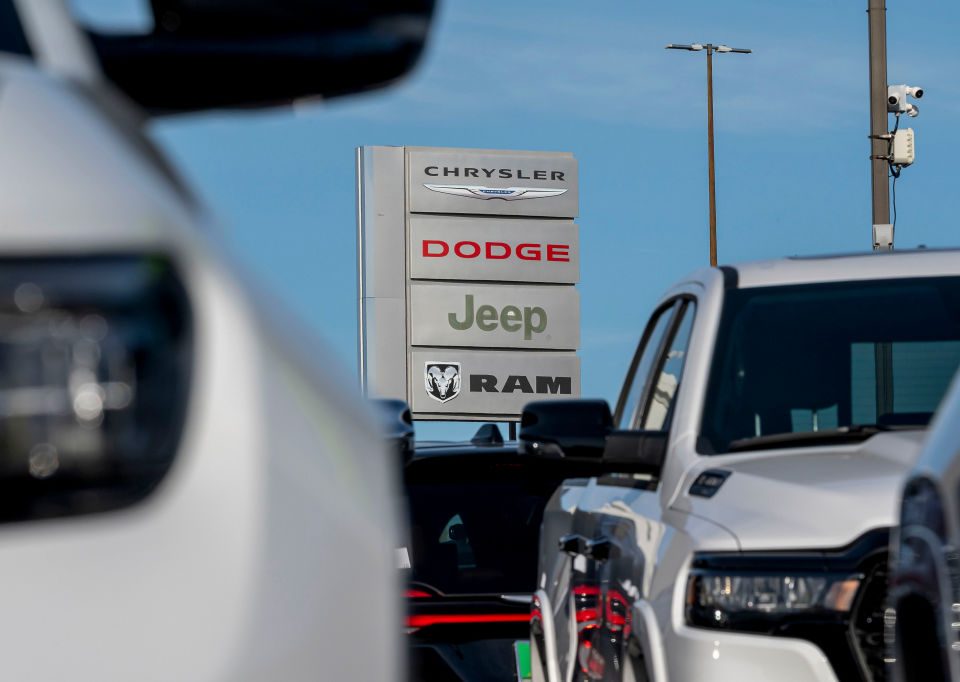 Chrysler, Dodge, Jeep, and Ram signage at a dealership in Richmond, California, US, on Monday, March 3, 2025.