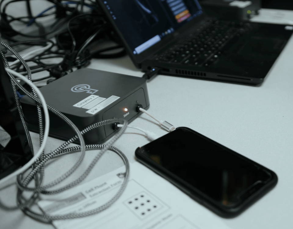 A man operates a Graykey phone hacking and unlocking device, made by Magnet Forensics. (Image: Magnet Forensics)