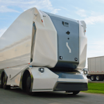 Einride's autonomous electric pod, a truck built without a cab for a driver, on road