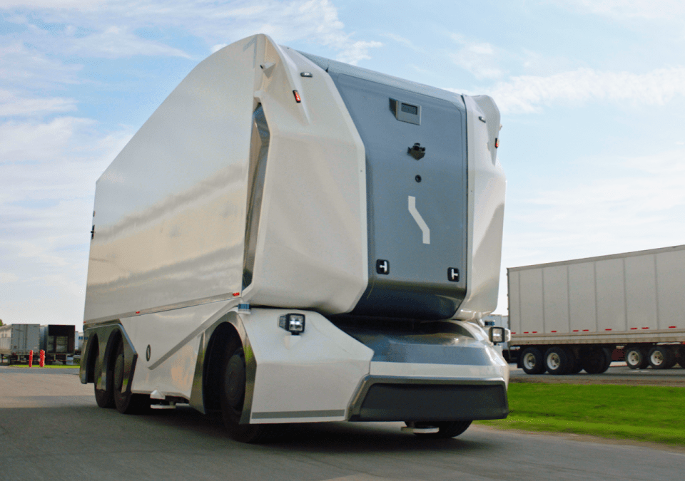Einride's autonomous electric pod, a truck built without a cab for a driver, on road