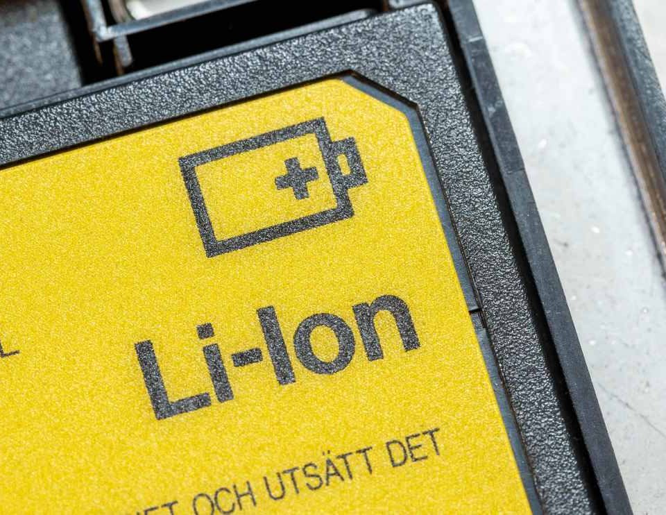 A label sits affixed to a lithium-ion battery.