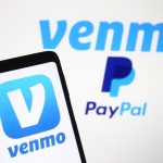 Venmo logo, a mobile payment service of PayPal is seen displayed on a smartphone and a PC screen.