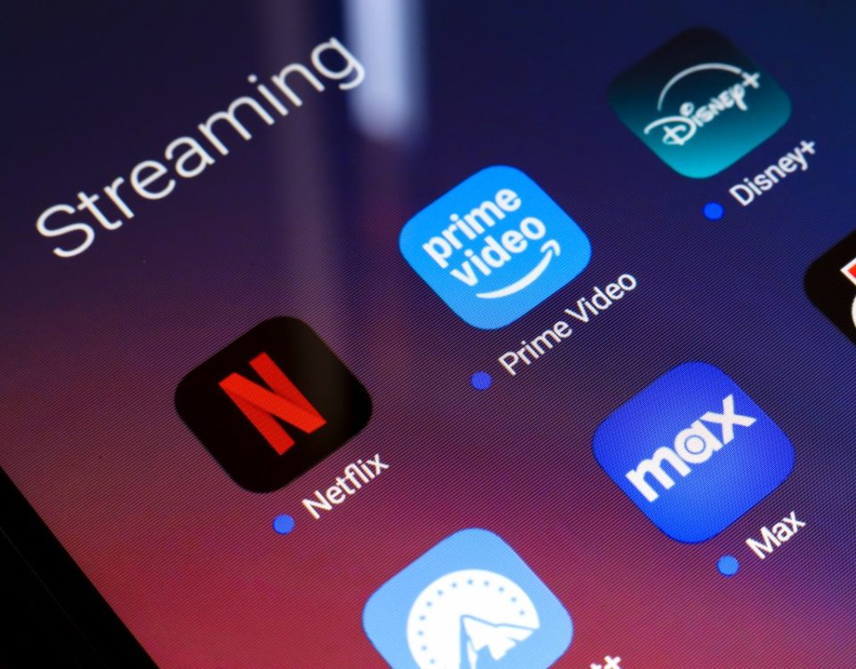 The streaming services Netflix, Amazon Prime Video, Disney Plus, Paramount Plus, Max, and Discovery Plus app appear on the screen of a smartphone