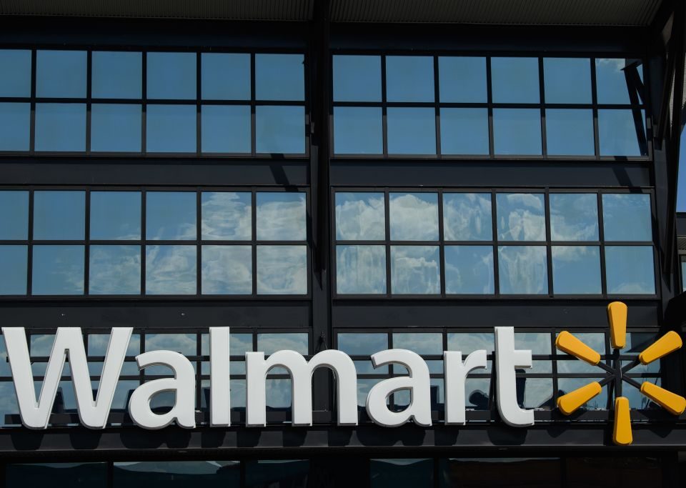 A Walmart logo is seen outside a store in Washington, DC, on August 18, 2020. (Photo by NICHOLAS KAMM / AFP) (Photo by NICHOLAS KAMM/AFP via Getty Images)