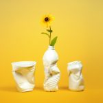 Plastic containers repurposed as vases