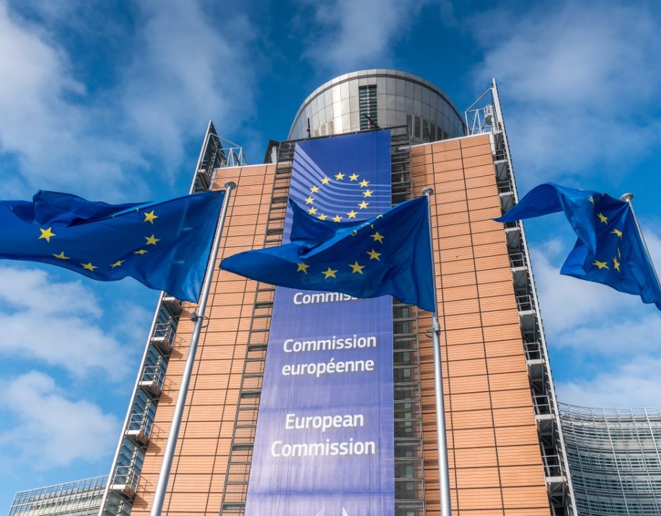 European Union flags waiving in front of Berlaymont building in Brussels