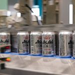 Cans of Asahi Super Dry beer move on the production line inside the Asahi Breweries Ibaraki plant, operated by Asahi Breweries Ltd., a unit of Asahi Group Holdings Ltd., in Moriya, Ibaraki Prefecture, Japan, on Tuesday, April 25, 2023.