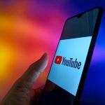 An illustration photo shows YouTube logo in a smartphone