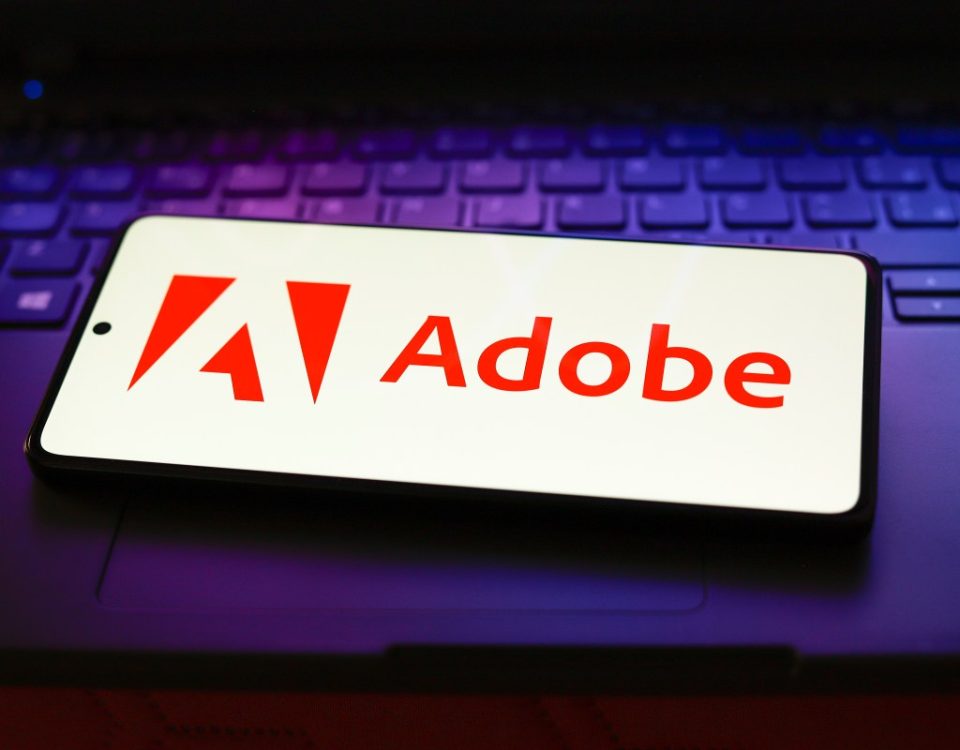 The Adobe Inc. logo displayed on a smartphone screen.